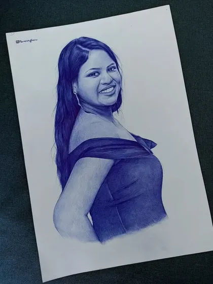 The completed portrait, drawn with a blue ballpoint pen. The final sketch captures her bright smile and the elegant look of her dress, making for a wonderful personal keepsake.