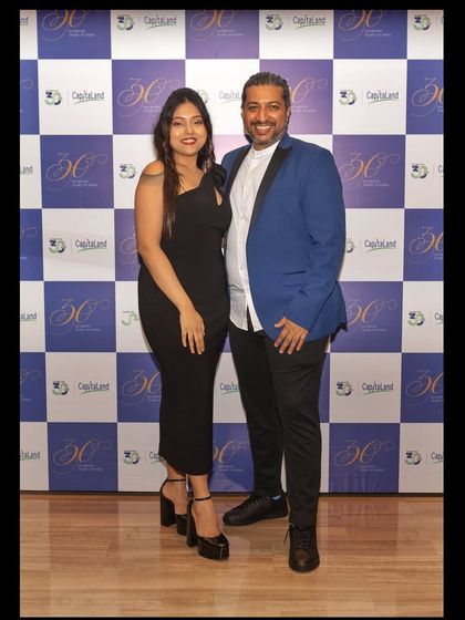 With my band leader, Adil Manuel, at the Capitaland corporate show. We work as a team to deliver a seamless and professional musical experience.