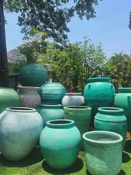 A beautiful collection of my terracotta planters in various shades of green and teal, perfect for embracing the mid-week blues.