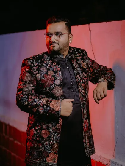 See how my black floral embroidered Indo-Western jacket looks when worn. It’s styled here for a modern, sophisticated look that’s perfect for a cocktail party or wedding reception. This piece makes a statement without you having to say a word.