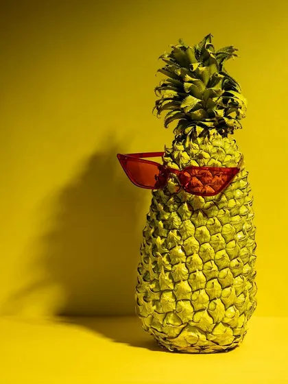 This is an example of a playful and conceptual shoot for an eyewear brand. Using a bold yellow background and a pineapple as a prop, I created a fun, memorable image that captures a summer vibe and is perfect for social media.