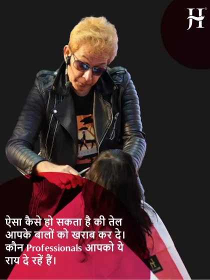 In this image, I am captured while giving a haircut, along with a question I often ask: "How can oil be bad for your hair?" It's important to question who is giving you advice and trust only real professionals.