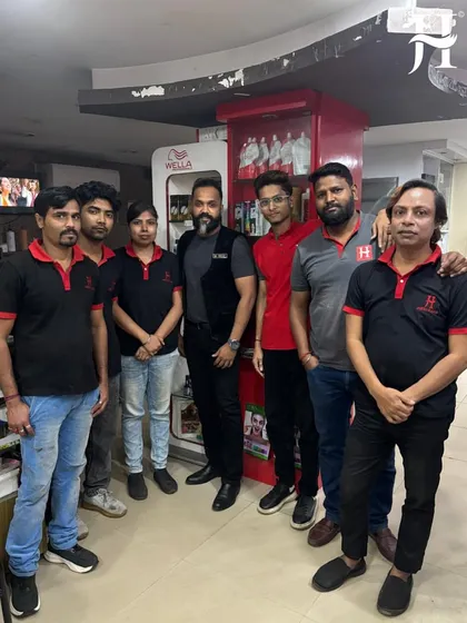 Another group photo of our stylists with our technical head during a training visit. A strong, well-educated team is the backbone of my brand.