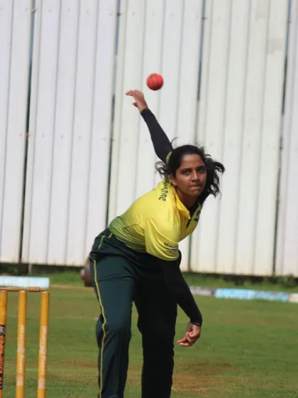 A female bowler in mid-action, generating pace and movement. Our bowling program focuses on developing a variety of skills.