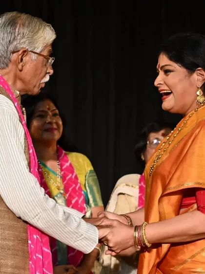 Sharing a laugh with a distinguished guest. An arangetram is not just a performance but a celebration that brings together friends, family, and well-wishers.