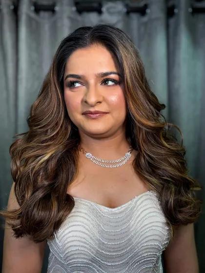 This shot captures the beautiful highlights and contours that define her face.