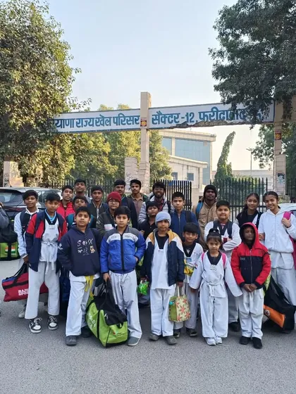 Team ASHA arriving at the Haryana State Sports Complex in Faridabad, ready to compete in the 4th Pride Cup Taekwondo Championship.