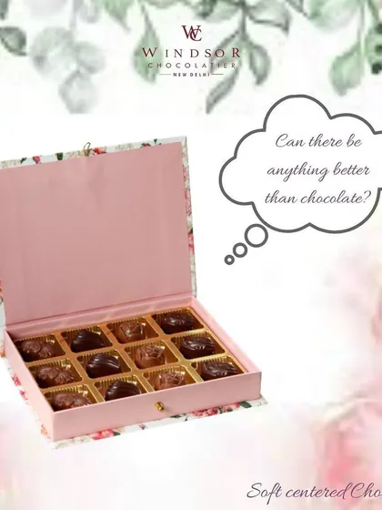 A lovely floral box filled with an assortment of my handmade soft-centered chocolates. This style of packaging is perfect for spring festivals, birthdays, or as a thoughtful thank-you gift.