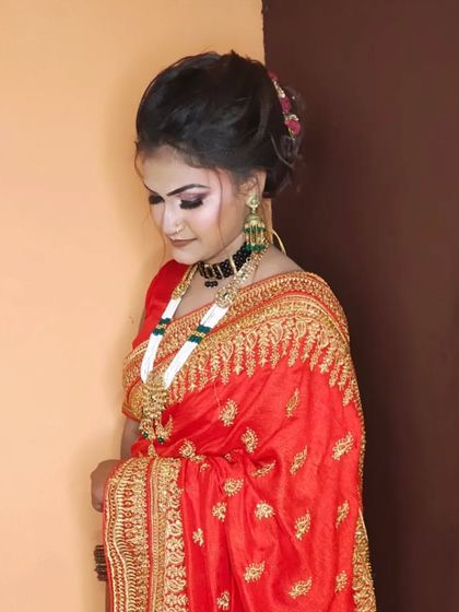 A candid-style shot that captures the elegance of the traditional party look.