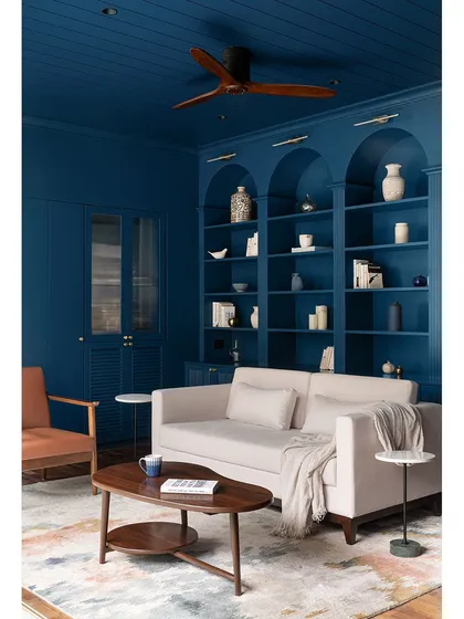 The color-drenched library at our Tinted Tapestries project, showcasing the floor-to-ceiling custom joinery. The repetition of the arches in the shelving creates a beautiful rhythm and sense of grandeur in the space.