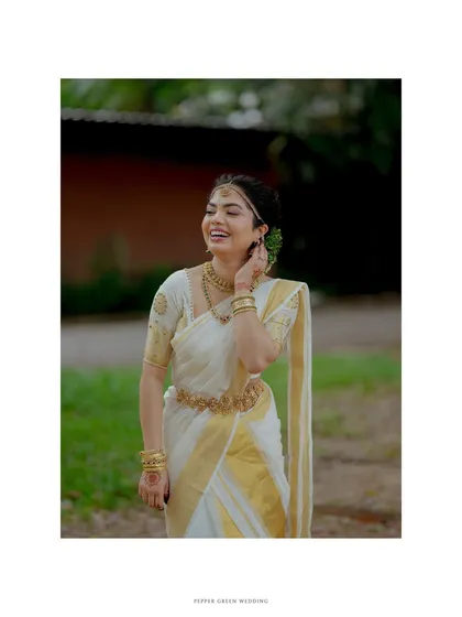 An elegant portrait of the bride, her joyful laugh captured in a timeless, beautifully framed shot.