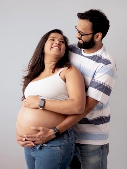 A sweet and casual couple's portrait. The way they look at each other shows all the love and anticipation they share on this journey together.