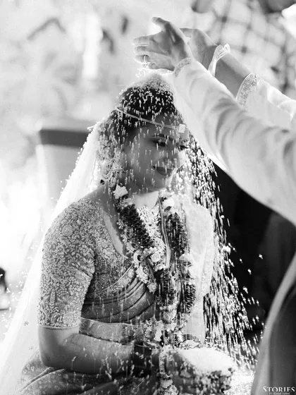 A black and white frame from Nihal and Sravanthi's South Indian wedding. The use of monochrome strips away distractions, focusing purely on the emotion and texture of the moment.