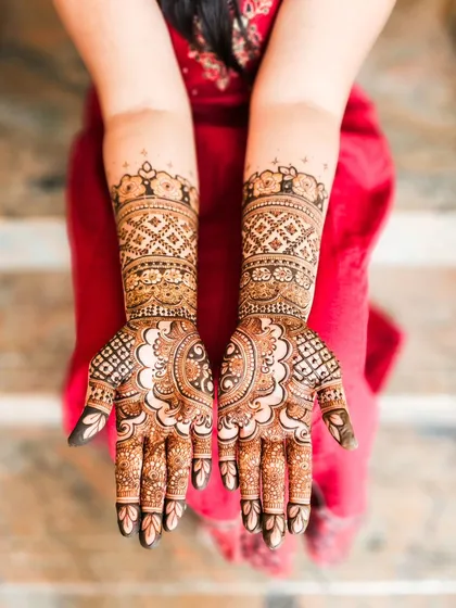 The full view of the design, showing the beautiful patterns on the palms.