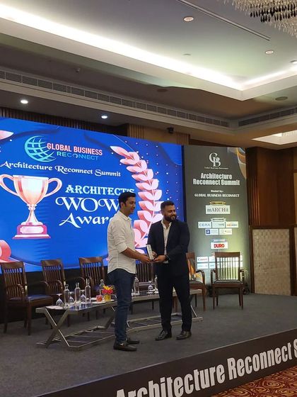 Accepting the Architect's WOW Award at the Global Business Reconnect Summit. We extend our heartfelt thanks to our hardworking team and wonderful clients for their belief in us.