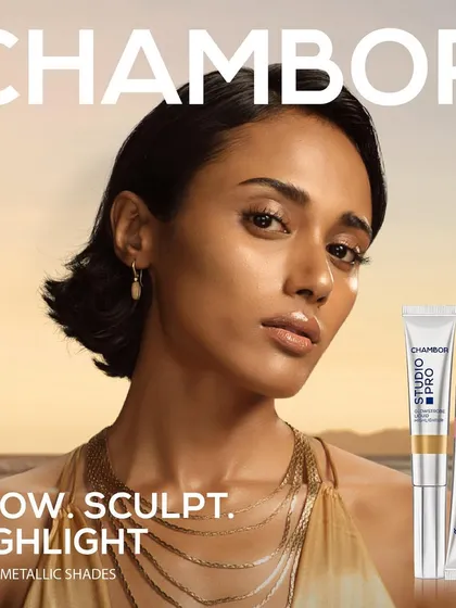 A golden-hour themed campaign image for Chambor Geneva's 'Studio Pro' line. The photograph features a model with a glowing, sculpted look, with the highlighter products displayed alongside her to connect the makeup to the final result. This demonstrates my ability to create different moods through lighting.