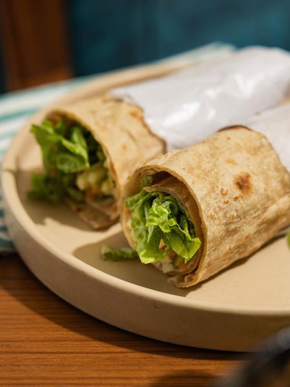 Our whole wheat wraps, like this paneer kathi roll, are a perfect on-the-go lunch. They are packed with protein and fresh veggies to keep you energized through a busy afternoon.