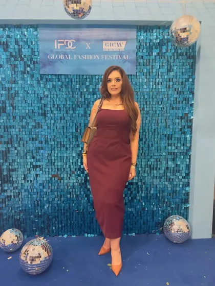 Attending the Lalit Dalmia fashion show in a simple yet elegant maroon bodycon dress. Sometimes, a great fit and a beautiful color are all you need to make a statement.