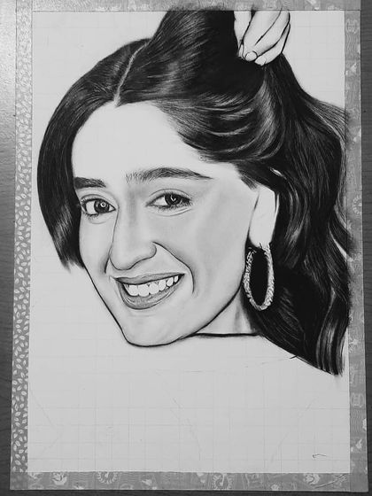 See how I drew Niharika NM's portrait. These images show the process from the initial grid and eye sketch to the final rendering of her hair and smile.