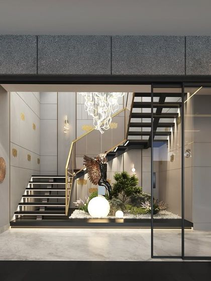 A modern staircase design featuring concrete panels with brass inlays. This combination of industrial chic and luxurious warmth creates a visually striking and one-of-a-kind look.