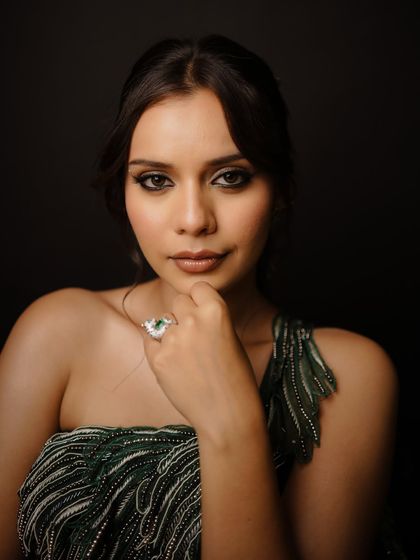 A captivating close-up of this dreamy, dramatic eye makeup. The shimmery lids and defined lash line make her eyes the focal point.