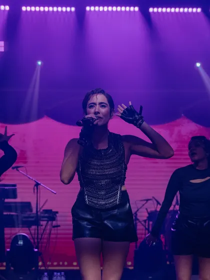 The stage comes alive with professional performers. We coordinate every aspect of the entertainment, including backup dancers and live musicians, to deliver a polished and high-impact show.