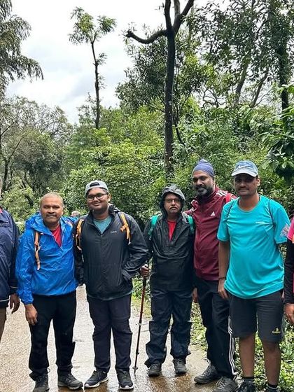 The full team from a corporate trek, ready for a day of adventure in the Western Ghats.