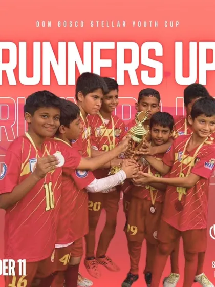 The Under-11 team proudly displays their runners-up trophy from the Don Bosco Stellar Youth Cup.