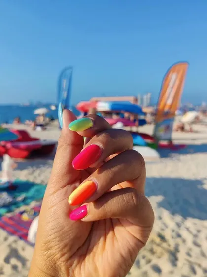 Another gorgeous holiday shot from my client in Dubai. The ombré summer nails look amazing against the blue ocean.