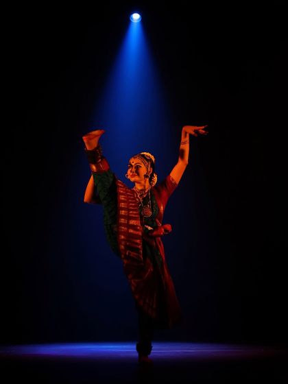 A moment of reaching for the divine, captured under a spotlight during my performance of 'Viśvambhara'. The lighting and atmosphere on stage add so much to the story being told.