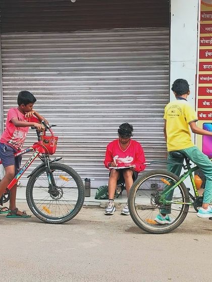 A cherished memory from the Nagpur Sita Burdi Sketchwalk on Children's Day. I was sketching on the side of the road when these kids with their bicycles stopped to watch.