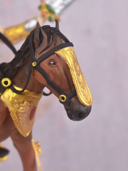 A close-up of the horse's head, showing the detailed bridle and the hand-painted eyes. Creating realistic and expressive animals is a challenge I truly enjoy.