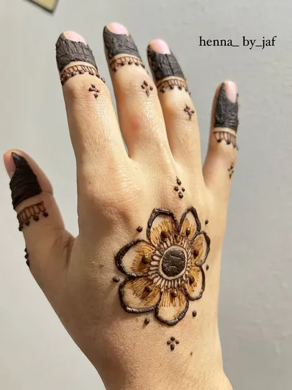 Another view of the single flower motif I created with my non-dominant hand.