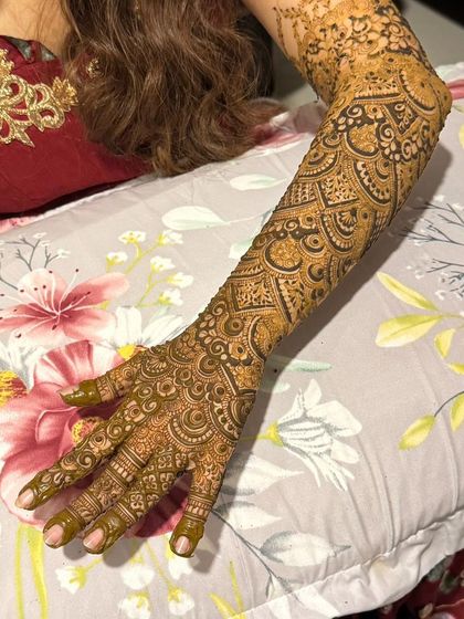 A full-arm bridal design with a rich, developing stain. This shows the beautiful color you can expect a day after application.