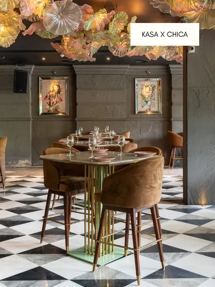 Our work for the restaurant Chica, featuring classic black-and-white checkerboard flooring. This timeless design grounds the eclectic and vibrant decor, adding a touch of refined elegance.