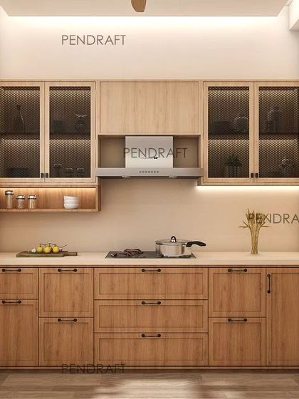 The main cooking area of the earthy-toned kitchen, featuring a well-organized layout with plenty of drawers and counter space, ensuring utility remains the top priority.
