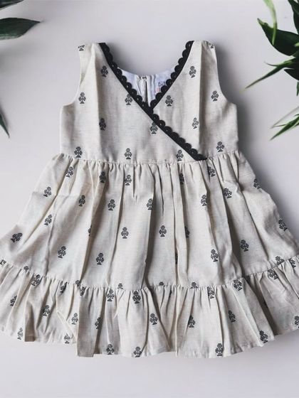 A simple and elegant A-line dress in a classic black and white print. The fabric is so soft, making it a comfortable choice for any occasion.