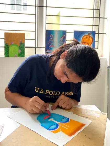 Another student from our CFA course working with oil pastels. The small class size allows for plenty of interaction and guidance.