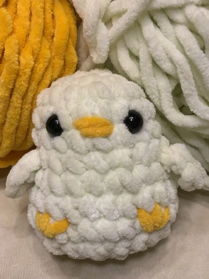 This little duck amigurumi is made with fluffy white yarn and has the sweetest lil' face. He looks even better in person, I promise!