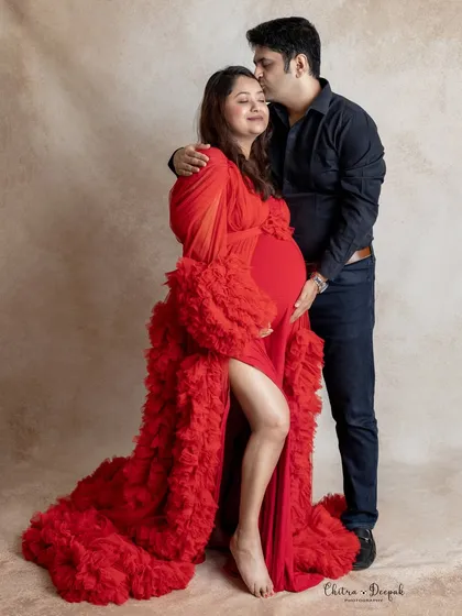 We believe maternity photos are about connection. This tender moment between an expecting couple, captured in our studio, showcases the love and anticipation that makes this time so special.