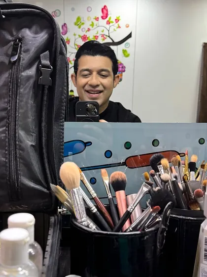 A quick mirror selfie in the makeup room. The makeup kit is where the transformation begins for any character.