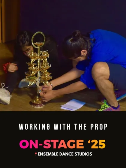 Working with props is a skill in itself. This behind-the-scenes shot shows the detailed preparation that goes into ensuring every element of the performance is perfect.