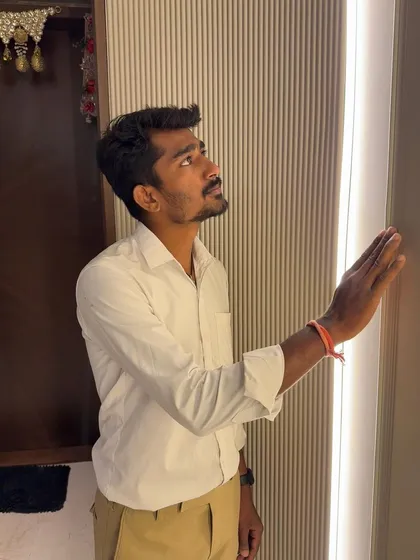 Here I am, checking the finish on the fluted wall panels and the profile lighting in a newly designed foyer. Every detail is inspected to ensure perfection.