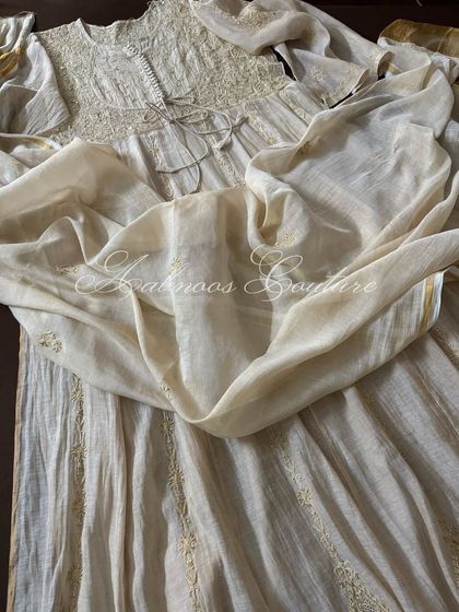 A full-length view of the Tissue Chanderi Anarkali with its matching dupatta, offering a more subtle, monochromatic look.