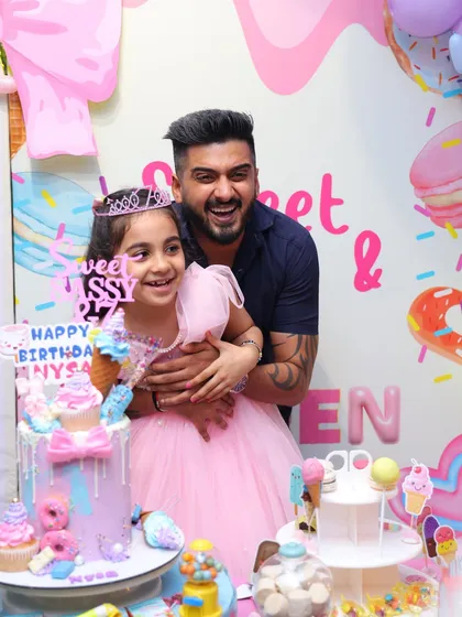 Pure joy at a Candyland-themed party. We create a world of sweets with donut and ice cream props, a custom cake, and a backdrop that looks good enough to eat.