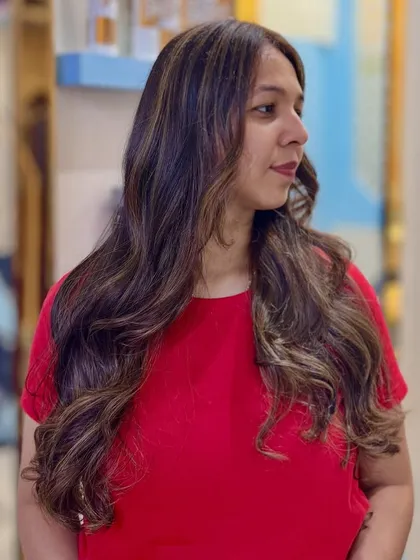 The Toffee highlights add just the right amount of brightness to her long, flowing hair.