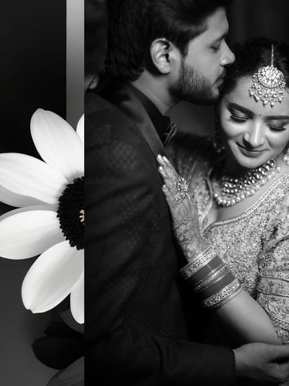 An intimate black and white portrait from Vitsal and Jagriti's reception. The groom's gentle kiss on her forehead and her serene smile make this a truly heartfelt and romantic photograph.
