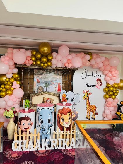 This setup shows how I can integrate a traditional swing into the decor for a naming ceremony or birthday.