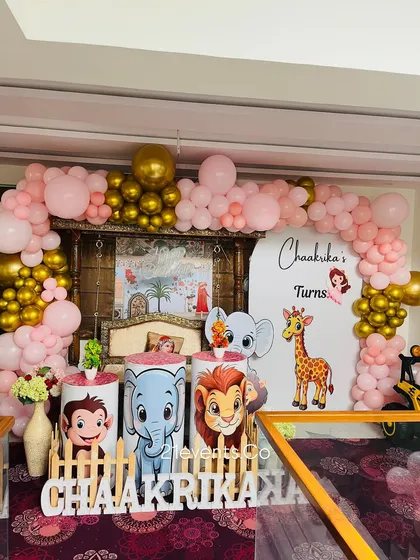 This setup shows how I can integrate a traditional swing into the decor for a naming ceremony or birthday.