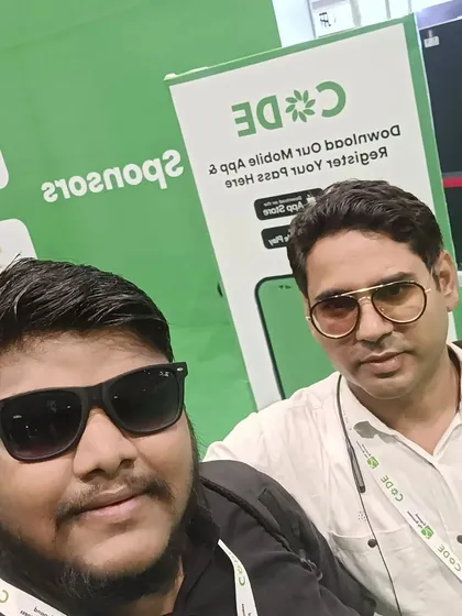 Connecting with a friend and fellow digital marketer at the event. Sharing knowledge and experiences with peers is an important part of how I grow and improve the services I offer.